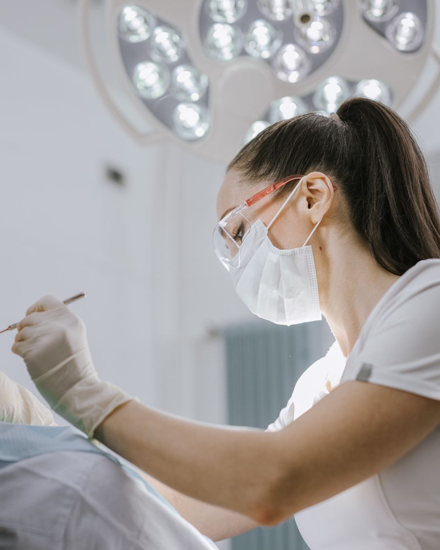 Dentist during a treatment in the surgery